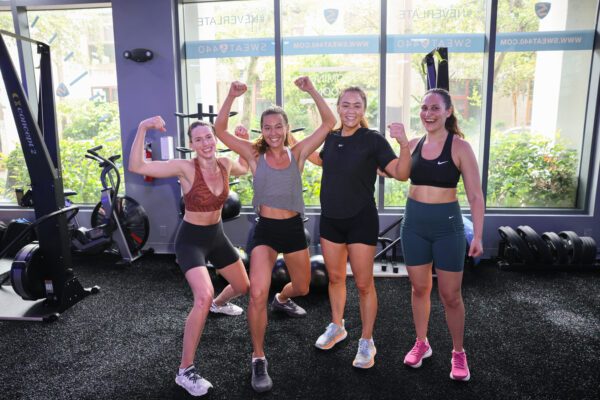 women group smiling SWEAT440